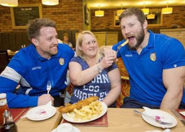 Wakefield Trinity Wildcats fan Catherine Wilkinson had a whale of time after winning a meal at with players Danny Kirmond and Nick Scruton.