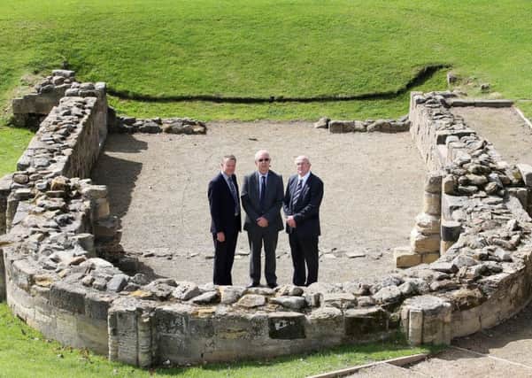 Work starts on Â£3.5m restoration scheme at Pontefract Castle. Coun Les Shaw, Wakefield Council's cabinet member for culture, leisure and sport, Coun Clive Tennent and Charles Aneley chairman of William Anelay Ltd, York
