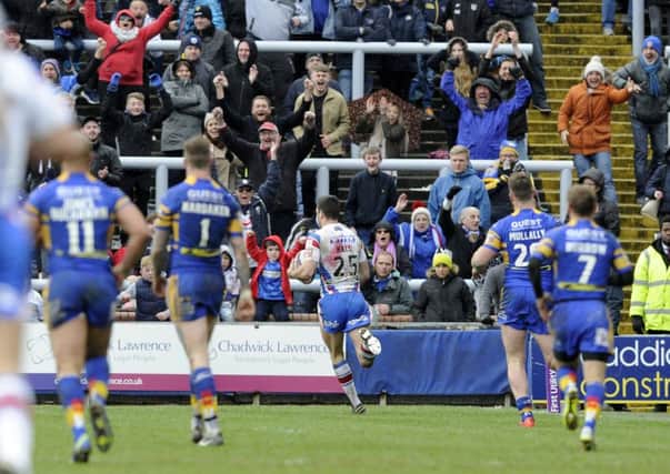 Craig Hall runs the wing to score Wildcats' match winning try at Leeds Rhinos.  Picture Bruce Rollinson