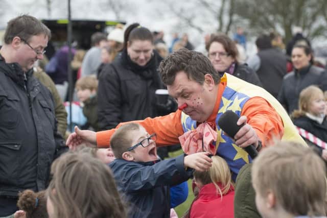 Picture by Allan McKenzie/YWNG - 19/03/16 - Press - World Downs Syndrome Day - Pontefract Park, Pontefract, England - Mr Crumble entertaining the children at the Downs Syndrome event at Pontefract Park.