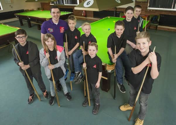 Anthony Hebblethwaite with the starlets at his new snooker academy.