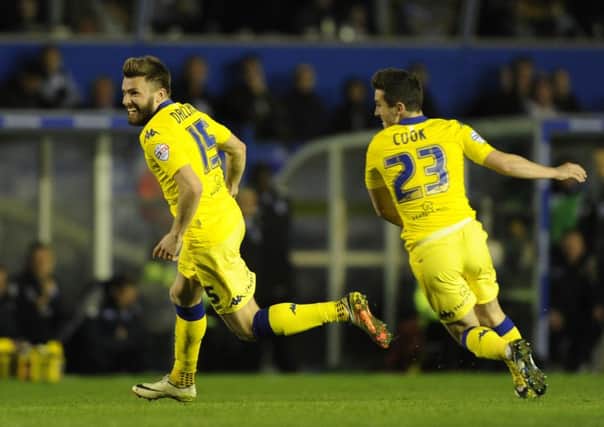 Stuart Dallas turns with Lewis Cook to celebrate his second goal for Leeds United at Birmingham City. Picture: Bruce Rollinson