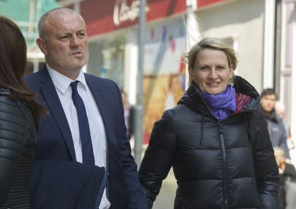 Former Leeds United manager Neil Redfearn and his partner Lucy Ward, arriving at Leeds Employment Tribunal.