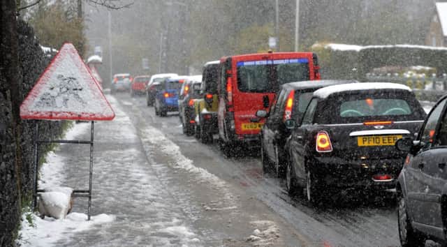 Heavy snowfall causes traffic chaos.