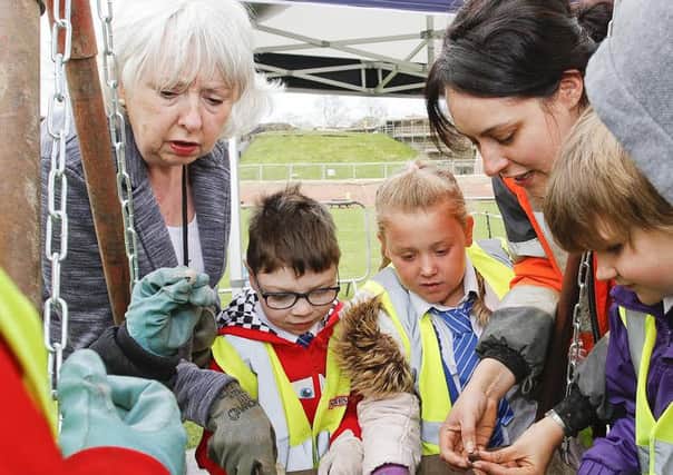 Pupils at St Helens Primary School in Hemsworth get involved in a dig at Pontefract Castle.
