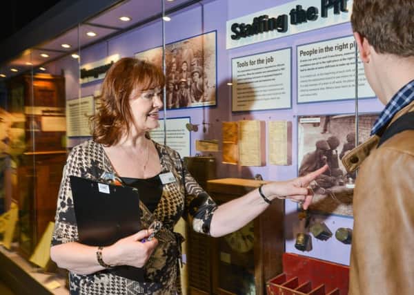 SHOWING THE WAY: A volunteer at the National Coal Mining Museum.