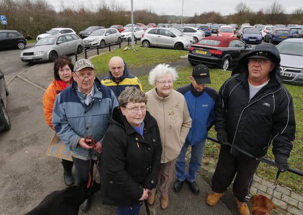 Coun Westmorland and residents at the station car park.
