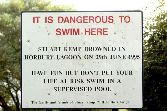 The warning sign erected by family and friends of Stuart Kemp who drowned in Horbury Lagoon.