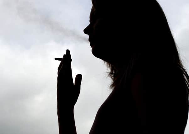 Silhouette of pregnant women smoking
