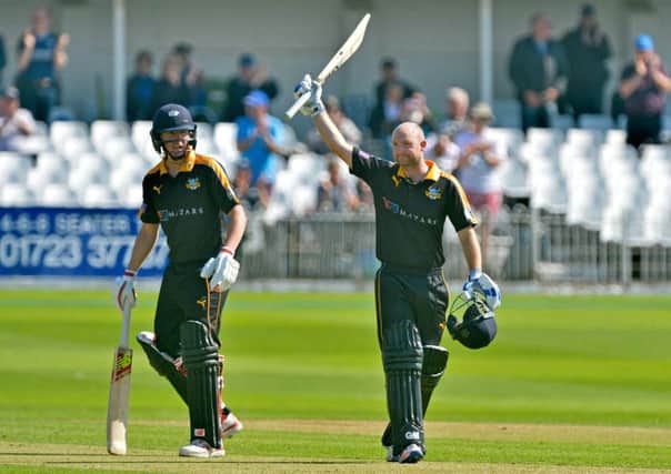 Adam Lyth celebrates his century for 
Yorkshire Vikings against Northamptonshire Steelbacks at Scarborough (Picture: Bruce Rollinson).