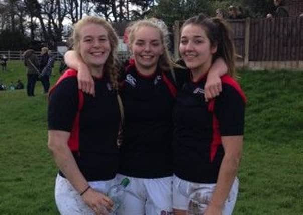 Castleford RUFC's Abi Burton, Emma Hardy and Tilly Churm are pictured in their Academy kit.