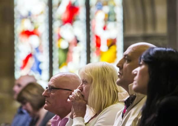 Churchgoers during a service for Jo Cox at St Peter's Church in Birstall. PIC: PA