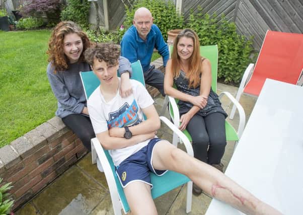 Oliver Sunderland, 15, with sister Amber,  dad Mark  and mum Kim.