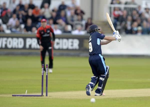 ON YOUR WAY: Yorkshire's Adam Lyth is bowled by Durham's Chris Rushworth for 4. Picture: Bruce Rollinson