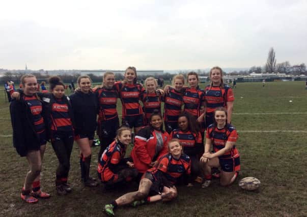 A girls rugby team from Brigshaw High School