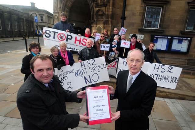 Campaigners delivering objections to the HS2 plans to Wakefield Council's Peter Box in 2014.
