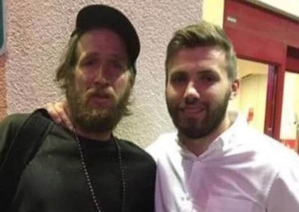 Stuart Dallas with the homeless man he and Juneve helped.