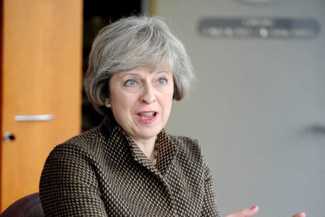 Teresa May.