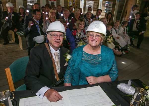 Sharon Hinchcliffe and Alan Torr tie the knot 140 metres underground at the National Coal Mining Museum. (Picture Ross Parry)