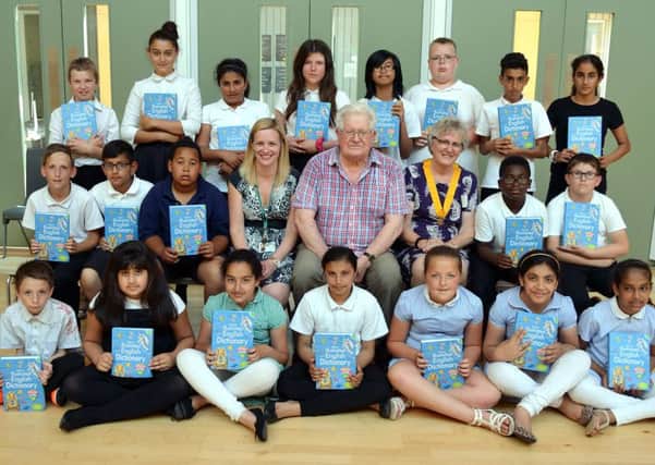 Students leaving Sandal Magna Community Academy to go to secondary schools in September were presented with dictionaries by Wakefield Rotary Club president-elect Sheila Wainwright.