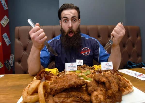 Dated: 21/05/2016The new ''Huckleberry's'' in Darlington, Co.Durham, an  American style diner which is the third 'Huckleberry's' opened by owners Sarah and John Rowlands following success York and Yeardon near Leeds.Pictured is Adam Moran aka UK challenge eater Beard Meats Food, who tackles mountainous food challenges and is having his belly insured for Â£1million #NorthNewsAndPictures/2daymedia