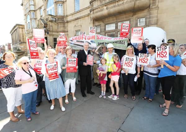 Wakefield Council leader Peter Box with members of the Crofton Against HS2 group outside Wakefield Town Hall.