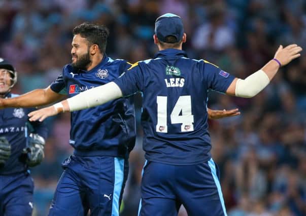 Yorkshire's Azeem Rafiq and Alex Lees celebrate another wicket in the T20 campaign.