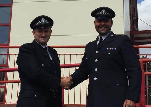 Inspector Geoff Carter and PC Charlie Banks, who is retiring after 30 years.