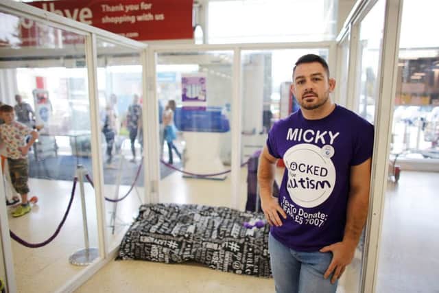 Micky Lockey from Hemsworth, is spending 50 hours locked inside a glass box, located in the foyer of the Tesco superstore in Hemsworth to raise awareness of autism, and the work that the national charity Caudwell Children does in supporting children with the condition.