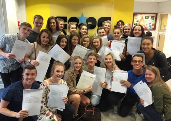 Students at Cathedral Academy of Performing Arts get their A level results.