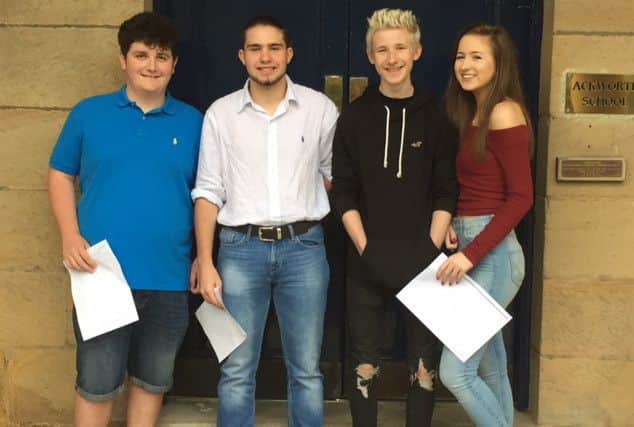 Pupils at Ackworth School with their GCSE results.