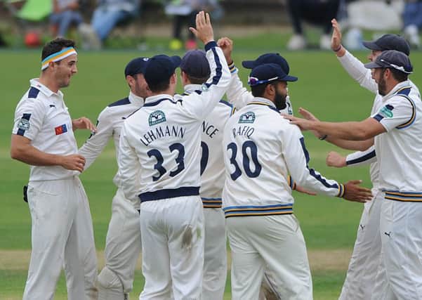 NICE START: Jack Brooks celebrates taking the wicket of Notts' Steven Mullaney before lunch at Scaroborough on day three. Picture: Dave Williams.