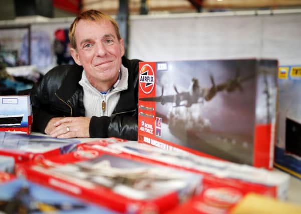 Neil Dodsworth has been unemployed for years after he had to quit his job as a school cleaner because of osteoarthritis. He has now set up a market stall in Wakefield selling Airfix models after he couldn't find any during a shopping trip.