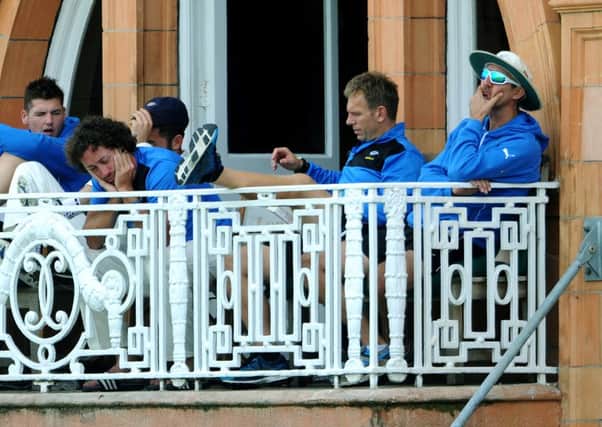 Yorkshire's first team coach Jason Gillespie and Ryan Sidebottom look dejected on the balcony at Lords.