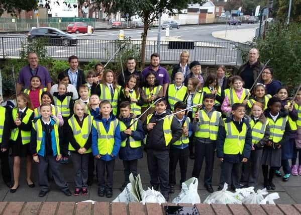 Students from Pinders Primary School and City Academy took part in a community clean-up of areas around College Grove.