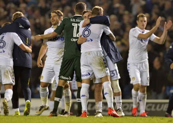 Leeds United players celebrate after their penalty shoot out win over Norwich.