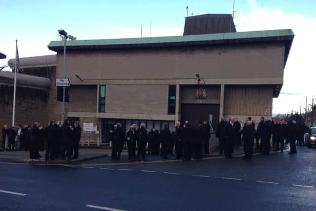 Officers pictured outside HMP Wakefield.