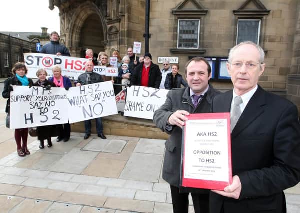 Members from anti-HS2 protest group AKA-HS2 with banners and documents they will hand to Wakefield Council leader Peter Box.