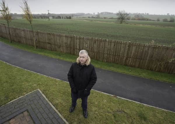 Picture by Allan McKenzie/YWNG - 22/11/2016 - Press - Oakland Development 200 Homes Protest - Pontefract, England - The view over the fields where 200 houses will be built with Paul Newby who is a disgruntled resident.
