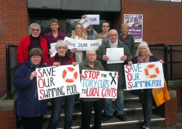 Protesters gather at Castleford swimming pool.