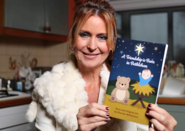 Rhonda Marie Williamson has first Christmas book published.