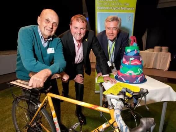 Brian Robinson, Sir Gary Verity and Malcolm Shepherd celebrate 20 years of the National Cycle Network.