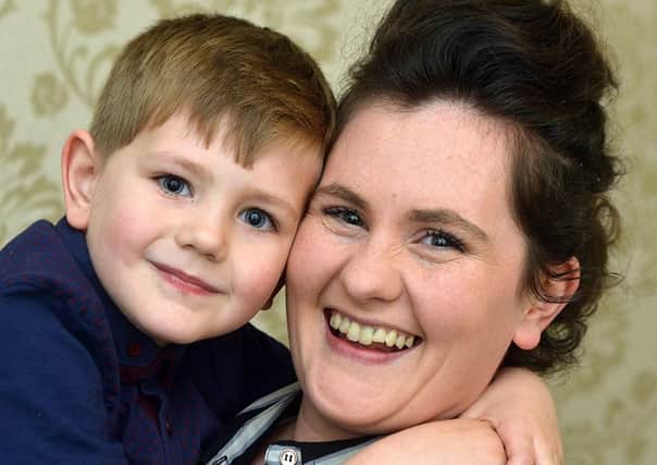 Little hero Charlie came to the rescue of mum Marie when she suffered an asthma attack.