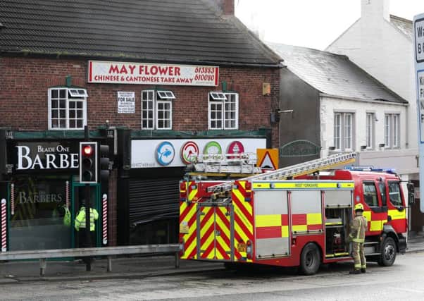 Takeaways on fire in Hemsworth. Blaze started at Chinese takeaway and fish and chips/kebab takeaway on Cross Hills