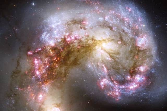 This is what a collision of galaxies looks like (Photo credit: NASA)