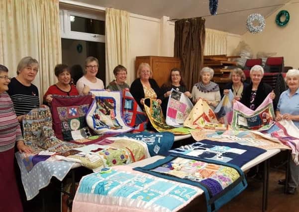 QUILTS: Squares for Care aims to trigger memories  for people living with dementia.