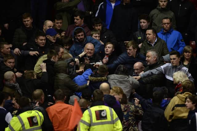 Scenes in the terraces during the Barnsley v Leeds United match at Oakwell. Picture: Bruce Rollinson