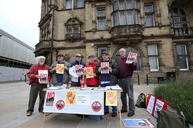 Anti-fracking protestors demonstrating outside county hall, Wakefield.
