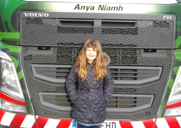 Anya Morris with the Eddie Stobart truck which has been named in her honour.