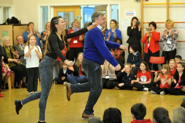 030217      Ed Balls  and his  Strictly Come Dancing Partner Katya Jones  performing Gangnam Styuu;le with pupils at Normanton Common Junior School in Normanton.
